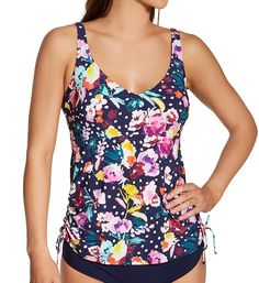 Fresh, whimsical floral patterns cover this tankini top, complete with a supportive shelf bra and adjustable sides. Made from nylon and elastane. Underwire, unpadded shelf bra has darts at the sides and bottom for shape. Bra sizing allows you to achieve the best possible fit for your shape. Elastic underband holds the shelf bra securely in place. V-neckline for a flattering shape, with covered elastic at the edges. Covered elastic straps adjust at back with coated metal hardware. Sides are gathe Fitted Tropical Tankini With Adjustable Straps, Blue Floral Print Tankini For Pool, Blue Floral Print Swim Dress For Pool, Blue Floral Print Tankini For Beach Season, Blue Floral Swim Dress For Pool, Floral Print Beachwear Tops For Pool, Blue Floral Print Summer Tankini, Floral Beachwear Tops, Blue Floral Print Tankini For Poolside