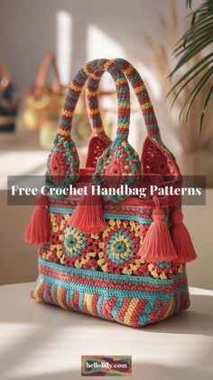 a crochet handbag pattern with tassels and pom - poms