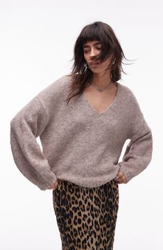 Get ready for sweater season in the enveloping softness of this generously sized sweater knit to layer or let star on its own in your look. V-neck Long sleeves 70% polyester; 21% nylon, 8% wool, 1% elastane Machine wash, dry flat Imported T Shirts Nordstrom, Oversized V-neck Sweater For Fall, Cozy Relaxed Fit V-neck Sweater For Layering, Beige Soft Knit V-neck Sweater For Fall, Cozy Soft Knit V-neck Sweater For Layering, Fall Chunky Knit V-neck Sweater, Beige V-neck Sweater For Fall Layering, Cozy Beige V-neck Sweater For Layering, Oversized V-neck Sweater With Soft Texture