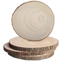 three wooden coasters stacked on top of each other in the shape of a circle