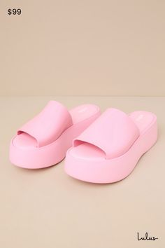 Cue the 90s nostalgia, because the Melissa Becky Pink Flatform Slide Sandals will be bringing a whole lot of throwback vibes! These chunky and cute sandals feature an almond-shaped footbed (atop a 1.5"" toe platform) and an extra-wide, shiny vinyl vamp strap that creates a classic peep-toe upper. From mini skirts to cutoffs, these shoes will be the perfect addition to any summer look! Available in whole sizes only. 2" flatform sole. Cushioned insole. Rubber sole has nonskid markings. Man made ma Spring Sandals With Removable Insole, Trendy Thick Bottom Sandals For Spring, Pink Round Toe Platform Slippers, Trendy Pink Round Toe Platform Slippers, Pink Cushioned Platform Slippers, Synthetic, Pink Synthetic Platform Slippers With Cushioned Footbed, Trendy Synthetic Slides With Round Toe, Summer Platform Sandals In Polyurethane, Summer Platform Sandals Made Of Polyurethane