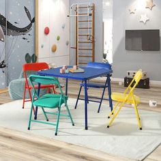 the children's table and chairs are colorfully arranged in an empty living room