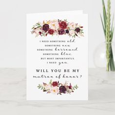 a card with the words will you be my bridesmaid? and flowers on it