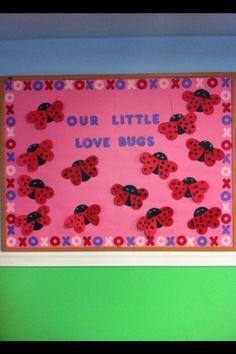 a bulletin board with ladybugs and the words our little love bugs on it