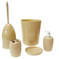 a bathroom set consisting of soap dispenser, toothbrush holder and cup