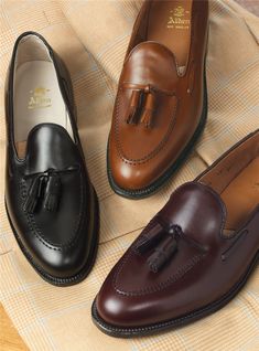 Classic Leather Moccasins With Tassels, Classic Leather Oxfords With Tassels, Classic Leather Tassel Loafers, Classic Leather Business Shoes With Tassels, Classic Formal Leather Shoes With Tassels, Elegant Formal Tassel Loafers With Goodyear Welt, Classic Tassel Loafers With Leather Sole For Galas, Classic Formal Moccasins With Tassels, Classic Business Moccasins With Tassels