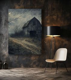 an empty room with a painting on the wall and a chair in front of it