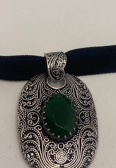 Very large ornate low content silver setting, Marker 925 but it is not. brilliant green emerald toned chrysoprase Over an inch long All jewelry is shipped in a nice gift box. Check out our over a THOUSAND great reviews Silver Emerald Necklace With Intricate Design, Bohemian Green Emerald Pendant Necklace, Formal Green Engraved Necklace, Antique Green Oval Jewelry, Green Oval Pendant For Jewelry Making, Green Oval Pendant Necklace With Engraving, Green Oval Pendant Necklace Engraved, Elegant Green Jewelry With Large Pendant, Bohemian Green Emerald Necklace Gift