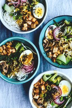 two plates filled with food next to each other