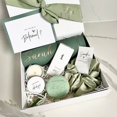 an open box containing soaps and candles