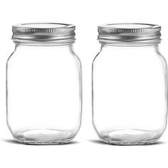 two empty glass jars with lids on white background