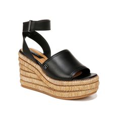 Franco Sarto-Toni Wedge Sandal The premium look of the Toni wedge sandal by Franco Sarto is sure to win gazes. Sustainable LWG Gold leather uppers and contrasting woven-like wedge heel make this hook-and-loop sandal stunning. A foam footbed provides cushioned comfort. Modern Ankle Strap Wedge Sandals For Beach, Spring Woven Leather Wedge Sandals, Modern Wedge Heels For Vacation, Spring Synthetic Woven Leather Wedge Sandals, Woven Leather Open Toe Synthetic Wedge Sandals, Black Woven Leather Heels For Summer, Black Wedge Sandals, Franco Sarto, Hush Puppies