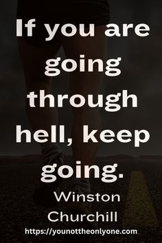 a person walking down the road with a quote above it that reads if you are going through hell, keep going