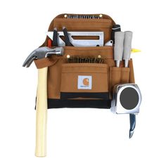 a tool bag filled with tools on top of a white background