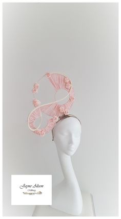 Make an entrance with this contemporary, yet feminine Hatinator in soft pink.  Offset circles have been embellished in pastel pink, whilst delicate pink roses randomly appear like the first day of spring.  Gorgeous.  Sits on a headband and secured with a comb.   This item has sold, however, similar pieces can be made in a variety of colours.  Please ask for details.  As every piece is handmade, some differences can occur from the photos listed on this site.  Made to order/bespoke/custom orders a Race Outfit, Red Fascinator, Kentucky Derby Fascinator, Derby Fascinator, Bride Hat, Wedding Hat, School Things, First Day Of Spring, Millinery Hats