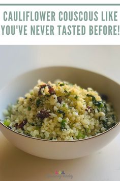 a white bowl filled with rice and broccoli on top of a table next to a sign that says, cauliflower couscous like you've never tasted before