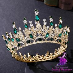 a gold tiara with green and white stones on it's headpieces