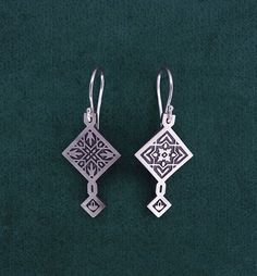 Constantinople earrings of the Orientalism line in sterling silver handmade in France. The pattern are inspired by forms of zelliges and oriental tiles. The Orientalism line evoke an fantasized and exotic Orient through patterns inspired by the North African art and architecture. These earrings are 27 mm height without the system hook, 38 mm with the hook and 15 mm width.  The silver is patinated to highlight the engravings and the spirit of the creation. We use only recycled, local and least po Arab Style, Mexican Jewelry, Arab Fashion, Large Hole Beads, Recycled Sterling Silver, African Art, Art And Architecture, Handmade Silver, Jewelry Earrings Dangle