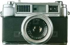 an old fashioned camera is shown on a white background