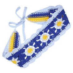 a blue and yellow crocheted headband with flowers on it