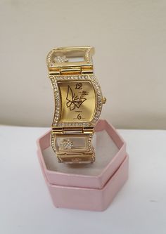 Women luxury watch in gold colour with shining rhinestones.  Stainless steel and water resistant.  Gift box and new battery are included. Dispatch from Sydney. Butterfly Watch, Rose Gold Watches, Pretty Roses, Bridal Bracelet, Gold Colour, Rose Gold Watch, Wrist Watches, Stainless Steel Material, Luxury Watch