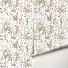 two wallpapers with rabbits and flowers on them