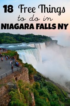 people are standing on the edge of a cliff looking at the water and falls in the distance