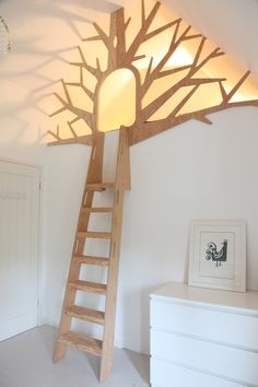 a room with a ladder and a tree lamp