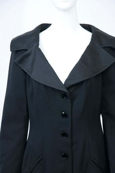 For Sale on 1stDibs - Jean Louis Scherrer classic black coatdress with tuxedo detailing in its taffeta spread collar and four-button wrists. The body is shaped with front and Timeless Fitted Formal Blazer Dress, Timeless Fitted Blazer Dress For Formal Occasions, Tailored Collared Outerwear For Formal Occasions, Classic Black Blazer Dress For The Office, Evening Suit With Notch Lapel And Buttons, Classic Black Blazer Dress For Office, Elegant Black Suit With Button Cuffs, Elegant Black Suits With Button Cuffs, Black Evening Blazer With Button Cuffs