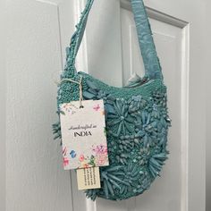 Beautiful Embellished Bag That Will Add A Unique Touch To Any Outfit. Has A Zipper Closure Blue Beaded Evening Bag, Evening Blue Beaded Bag, Blue Embroidered Shoulder Bag For Shopping, Blue Bohemian Beaded Bag, Blue Beaded Shoulder Bag As Gift, Blue Beaded Shoulder Bag For Gift, Blue Beaded Shoulder Bag Gift, Blue Embellished Bag For Everyday Use, Summer Blue Beaded Shoulder Bag