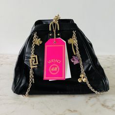 New With Tags. Shows Wear On The Magnet & Defect On Leather Over Time. * Solid, Chain Accents, Metal Accents, Black 10.75" Length, 8.75" Height, 5.25" Depth Pet Free & Smoke Free Environment. Metal Accents, H&m Women, Women Accessories Bags, Metallic Accents, Womens Tote Bags, Gold Chains, Versace, H&m, Shoe Accessories