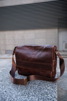 "Leather Postman messenger bag for a laptop ✅ Fit laptops up to 16\" in the main compartment And up to 15\" in the special isolated compartment for laptops with protective lid which protect your laptop from scratches of the zipper when you taking it out of the bag ✅ Handcrafted from high-quality full-grain leather ✅ Also leather lining inside. Pleasant to touch and much more reliable than fabric lining ✅ 3 comparentments + 1 zippered pocket + 1 additional open pocket inside for you phone, pens, documents and small things ✅ Has a swivel bolt snap for keys ✅ Magnet closure (has hidden magnets in a lid) ✅ Solid brass hardware ✅ Brass YKK zipper ✅ Adjustable shoulder strap Sizes: 13\" x 10\" x 2.5\" inches 33 cm x 25 cm x 6 cm Minimalistic and stylish carrier for a laptop and documents. May be Business Crossbody Laptop Bag In Soft Leather, Leather Laptop Shoulder Bag For Business Trips, Leather Laptop Shoulder Bag With Luggage Sleeve, Leather Shoulder Laptop Bag With Luggage Sleeve, Leather Crossbody Laptop Bag With Laptop Sleeve, Rectangular Leather Flap Bag For Business, Leather Flap Bag For Business, Business Crossbody Briefcase With Laptop Sleeve, Business Leather Bag With Laptop Sleeve