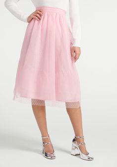 With a hint of Old Hollywood glam, this vintage-inspired pink skirt will take you through the holidays in style and go on to become a year-round favorite. Beginning with a gathered, high-waisted skirt made from a stretchy cotton-blend weave that’s generously draped in a swiss dot flocked tulle overlay, this tutu-inspired A-line skirt boast a high-rise waistband with side zip closure and finishes just below the knee with a sheer tulle hemline. 95% Cotton, 5% Spandex Imported Model Measurements: H Pink Heart Skirt Midi, Cheap Feminine Pink Skirt, Feminine Tulle Midi Skirt, Feminine Midi Tulle Skirt, Spring Party Flared Skirt, Chic Pink Full Skirt Bottoms, Feminine Midi Skirt For Party, Spring Party Skirted Bottoms, Party Knee-length Tulle Bottoms