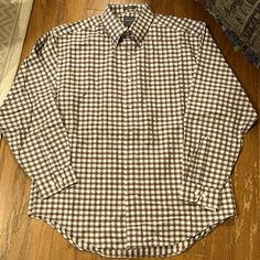 New With Tags, Never Been Worn. Color Is A Checkered Brown, Off White Mix. Size Is L. Would Pair Really Good With Brown Sweater Vest I Have Listed Separately As Well! Classic Brown Tops With Button Closure, Plaid Button-up Shirt For Business Casual, Plaid Top With Button Closure And Spread Collar, Plaid Top With Spread Collar And Button Closure, Classic Brown Flannel Shirt With Button Closure, Brown Buttoned Top For Business Casual, Plaid Top With Button Closure For Business Casual, Long Sleeve Gingham Shirt With Button Closure, Classic Plaid Button-up Top