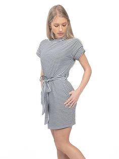 The Striped Short Sleeve T-shirt Dress with Pocket combines comfort and style in one effortlessly chic piece. Featuring a classic striped pattern and a relaxed fit, this dress is perfect for casual outings and everyday wear. The short sleeves provide a laid-back feel, while the pocket detail adds a touch of functionality and charm. Crafted from soft and breathable fabric, it offers all-day comfort and ease of movement. Whether paired with sneakers for a relaxed look or sandals for a summer day out, this dress is sure to become a go-to favorite in your wardrobe. Versatile and stylish, the Striped Short Sleeve T-shirt Dress with Pocket is a must-have for any fashion-forward individual. Chic Striped Short Sleeve Mini Dress, Chic Striped Mini Dress With Short Sleeves, Trendy Striped Mini Dress For Day Out, Casual T-shirt Dress For Summer Workwear, Chic Cotton T-shirt Dress, Casual Summer Mini Dress With Vertical Stripes, Casual Mini Dress With Striped Hem, Chic Striped Cotton Mini Dress, Trendy Striped Short Sleeve Dress