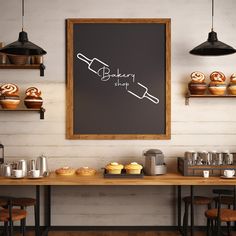 a bakery shop with cupcakes and muffins on the table in front of it