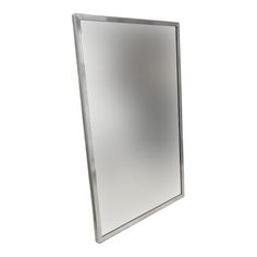 a mirror is shown on the wall with no reflection in it's glass frame