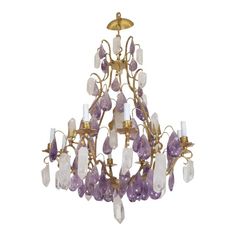 an antique chandelier with amethorate crystals