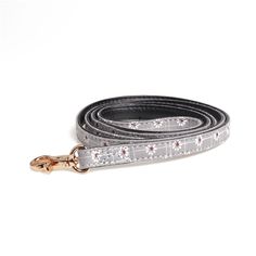 a dog leash on a white background with red and white stars in the pattern,