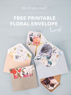 some cards and envelopes on a table with the text do it yourself free printable floral envelope