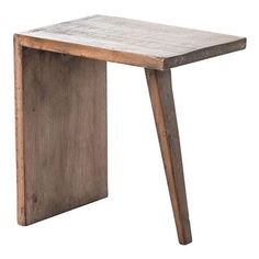 a small wooden table sitting on top of a white floor