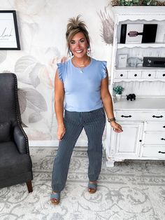 This top is about to become your new go-to for laid-back style. Crafted from an ultra-soft poly blend, this relaxed-fit knit feels like your favorite lived-in t-shirt. But its fluttering ruffle sleeves and rounded neckline add a flirty, feminine twist. Slip it on for brunch with friends or a casual date night—its dreamy comfort and stylish details are sure to boost your confidence and your mood. When keeping your head up feels hard, this top will give you an instant lift. Let its lively color an Trendy Ruffled Tops For Loungewear, Casual Cotton Tops With Butterfly Sleeves, Casual Tops With Butterfly Sleeve For Workwear, Casual Butterfly Sleeve Tops For Workwear, Casual Workwear Top With Butterfly Sleeves, Casual Ruffle Sleeve Tops, Casual Cotton Top With Butterfly Sleeves, Day Out Tops With Flutter Sleeves And Stretch, Day Out Stretch Tops With Flutter Sleeve