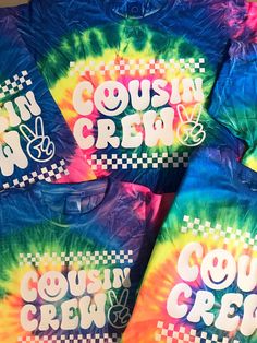 COUSIN CREW TIE DYE T-SHIRT WITH SMILE FACE GRAPHIC AND CHECKERED PRINT ♡ Available in Black Tie Dye, Orange Tie Dye, and Neon Rainbow Tie Dye. (Toddler sizes only available in neon rainbow) **Items sole individually so you can mix&match colors and sizes (For both shirts, please add 2 items to your cart!)  ♡ Material ♡ 100% Cotton Double-needle stitching throughout Seamless rib at neck Shoulder-to-shoulder tape Wash separately No two are alike Unisex sizing (size chart in photos) Pre-washed and Fun Tie Dye Top With Graphic Print, Family Matching Multicolor Letter Print Tops, Family Matching Multicolor Tops With Letter Print, Multicolor Letter Print Family Matching Tops, Multicolor Letter Print Tops For Family Matching, Fun Tie-dye Pre-shrunk Top, Fun Tie Dye Crew Neck Top, Fun Tie Dye Pre-shrunk Top, Fun Pre-shrunk Tie Dye Top