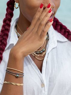 "Flaunting a colorful pearlescent finish, the peacock pearls strung along this adjustable beaded bracelet have been emphasized with gold-filled accents for a sizzling tropical twist. ✦ DETAILS ✦ ✧ Name: Maile (MIE-leh) - vine. ✧ Adjustable Length from: 6\"-7.5\" Inches. ✧ Black/Peacock 2-3mm Freshwater Pearls. ✧ 14kt Gold Filled Components, Extender, and Clasp. ✧ All Ke Aloha Jewelry pieces come packaged thoughtfully, beautifully, and ready for gift giving. ✦ MORE GOLD BRACELETS ➤ https://www.et Elegant Multicolor Stackable Beaded Bracelets, Elegant Multicolor Stackable Jewelry, Elegant Multicolor Jewelry With Pearl Charm, Elegant Multicolor Pearl Charm Jewelry, Elegant Multicolor Stackable Bracelets, Multicolor Pearl Charm Bracelet, Elegant Multi-strand Hand-strung Bracelet, Multicolor Adjustable Gold Bracelet, Elegant Adjustable Multicolor Gold Bracelet