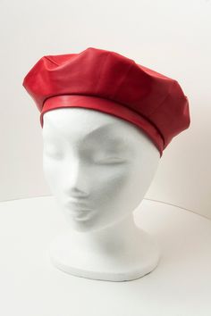 Red Vinyl French Beret for Women. A trendy hat perfect for a Parisian style that will surely brighten up any outfit.  Easy to wear and very comfortable, it is also weatherproof which make it perfect for a rainy day. All of our accessories are handmade with particular attention to detail.  We make sure to include unique materials which you are unlikely to find anywhere else in the world. Offered as made-to-measure, Use our size chart and measuring tips to make sure you to find the perfect fit. Packaged in a zip lock bag and sent same day for extra fast delivery. If you are looking for something tailor made or specific, please contact me through my shop! Thank you for visiting  XX Aurélia Red Flat Cap Beret For Fall, Adjustable Red Winter Beret, Red Adjustable Winter Beret, Vinyl Hat, Hat French, Tweed Hat, Red Beret, Style Parisienne, French Beret