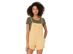 Billabong Wild Pursuit Short Overalls - Women's Jumpsuit & Rompers One Piece : Gold Dust : Part romper, part overalls. Keep things laid-back with the Billabong Wild Pursuit short overalls! Short overalls in a woven cotton-viscose fabrication flaunts a vintage wash for a well-worn feel. Front bib pocket. Slash front pockets and back pack pockets. Adjustable tie front straps. Metal logo badge adorns back. Rolled hem. 60% cotton, 40% viscose. Hand wash, hang dry. Imported. Measurements: Inseam: Jumper Suit, Plain Jumpsuits, Cute Jumpers, Fits For Summer, Short Overalls, Sundress Dress, Mom Fashion, Gold Dust, Mini Sundress