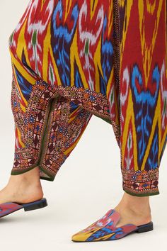 Pickle turkish pant with paisley and geometric print all over.
Components: 1
Pattern: Printed
Type Of Work: Paisley, geometric
Fabric: Satin
Color: Multi Color
Other Details: 
Elasticated back
Note: Top worn by the model is not for sale
Occasion: Work - Aza Fashions Bohemian Festive Harem Bottoms, Traditional Bottoms With Printed Motifs For Eid, Traditional Multicolor Trousers, Multicolor Paisley Print Wide Leg Pants, Traditional Pants With Printed Motifs For Eid, Traditional Multicolor Festive Bottoms, Traditional Festive Multicolor Bottoms, Festive Traditional Multicolor Bottoms, Traditional Pants With Printed Motifs For Festivals