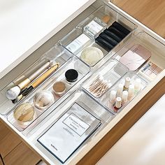 the drawers are organized with makeup and beauty products