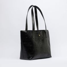 Material: Structured croc-embossed genuine cow leather. Interior: Lined with canvas Color: Black Height: 29 cm 11.4 inch Length: 35 cm 13.8 inch Depth: 18 cm 7.1 inch Weight: 0.74 Kg 1.63 Lb. Modern Black Shoulder Bag With Crocodile Pattern, Modern Black Crocodile Pattern Shoulder Bag, Classic Leather Shoulder Bag With Crocodile Pattern, Leather Shoulder Bag With Crocodile Pattern For Business, Business Leather Shoulder Bag With Crocodile Pattern, Classic Crocodile Pattern Shoulder Bag For Work, Black Leather Bag With Crocodile Pattern, Black Crocodile Pattern Shoulder Bag For Work, Black Crocodile Pattern Bag For Work