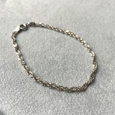 Perfect for stacking with other minimal bracelets! This Vintage 00's sterling silver wheat chain bracelet is stamped "Made in Italy" by Milor.  Bracelet Length: 7.25" Chain width: 3mm Everyday Sterling Silver Bracelet With Curb Chain, Dainty Silver Chain Bracelet With Lobster Clasp, Silver Sterling Braided Bracelets For Everyday, Everyday Silver Sterling Braided Bracelets, Classic Silver Wheat Chain Bracelet, Everyday Silver Sterling Silver Braided Bracelet, Dainty Silver Link Charm Bracelet, Classic Wheat Chain Bracelet As Gift, Classic Wheat Chain Bracelet For Gift